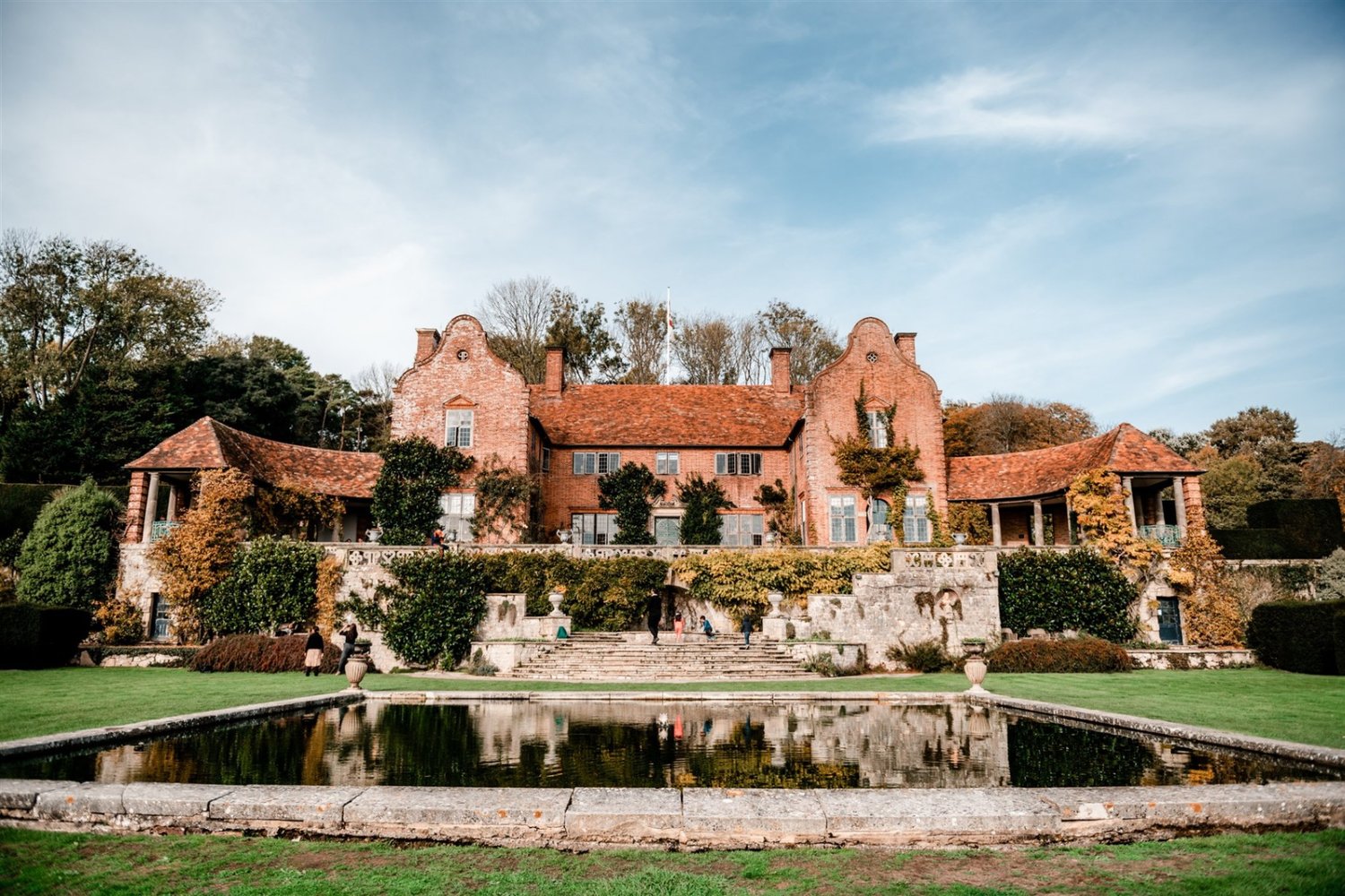 Outside of the wedding venue with a small pond 