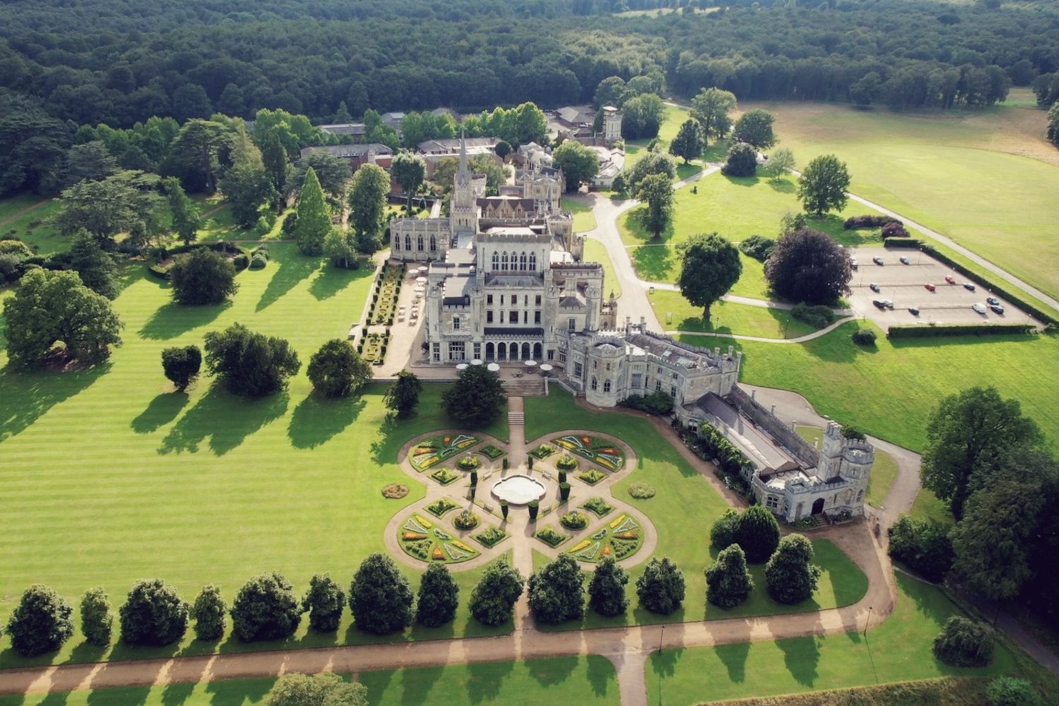 An aerial shot of the extensive grounds at Ashridge house on a bright day 